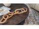 Coffee table with books and decorative wooden chain at 511 Lochalsh Dr, Gibsonville, NC 27249