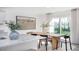 Dining area with an abundance of natural light, a painting, and access to the backyard at 511 Lochalsh Dr, Gibsonville, NC 27249