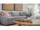 Inviting living room showcases a comfortable sofa, wooden coffee table, and stylish decor creating a cozy atmosphere at 511 Lochalsh Dr, Gibsonville, NC 27249