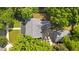 Aerial view of a property with a well-maintained roof and surrounding greenery at 518 S Main St, Wake Forest, NC 27587