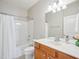 Clean bathroom with a shower/tub combo, a vanity, and ample lighting at 519 Garendon Dr, Cary, NC 27519