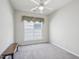 Bedroom with wall-to-wall carpeting and a bright window at 519 Garendon Dr, Cary, NC 27519