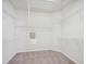 Walk-in closet with white wire shelving, offering ample storage space for clothes and personal items at 519 Garendon Dr, Cary, NC 27519