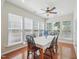 Bright dining area with hardwood floors, large windows, and comfortable seating at 519 Garendon Dr, Cary, NC 27519