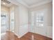 Inviting foyer with hardwood floors and a view into the laundry room at 519 Garendon Dr, Cary, NC 27519