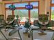 Well-equipped gym with treadmills, exercise bikes and two TVs at 519 Garendon Dr, Cary, NC 27519