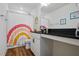 Bathroom with a rainbow shower curtain and black granite countertop at 521 Glenwyck Ct, Fuquay Varina, NC 27526