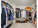 Spacious walk-in closet with shelving and rods for ample storage of clothes, shoes, and accessories at 521 Glenwyck Ct, Fuquay Varina, NC 27526