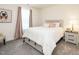 This cozy bedroom features neutral colors, plush textures, and ample natural light at 555 Whitley Ridge Dr, Clayton, NC 27527