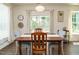 Inviting dining room with a wooden table and natural light at 555 Whitley Ridge Dr, Clayton, NC 27527