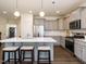 Spacious kitchen with a center island and stainless steel appliances at 555 Whitley Ridge Dr, Clayton, NC 27527