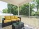 A comfy outdoor seating area with a great view of the trees is featured at 555 Whitley Ridge Dr, Clayton, NC 27527
