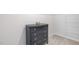 Spacious walk-in closet featuring a dresser and wire shelving at 5913 Sodium St, Raleigh, NC 27610