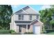 Charming two-story home with gray siding, brick accents, covered entry, and attached garage at 6036 Sodium St, Raleigh, NC 27610
