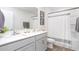 Bright bathroom showcasing double sinks, modern fixtures, and a shower-tub combination at 6041 Sodium St, Raleigh, NC 27610