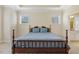 Bedroom featuring tray ceiling, carpet floors, and bright, natural lighting at 624 Meadowgrass Ln, Wake Forest, NC 27587