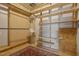 Unfinished closet with wood shelving and a small oriental rug at 624 Meadowgrass Ln, Wake Forest, NC 27587