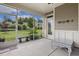 Relaxing screened-in patio with views of the well-manicured lawn and surrounding landscape at 624 Meadowgrass Ln, Wake Forest, NC 27587