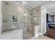 Modern bathroom with a glass-enclosed shower, built-in bench, and stylish finishes, creating a spa-like atmosphere at 7304 Hasentree Club Dr, Wake Forest, NC 27587