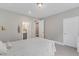Bedroom featuring neutral decor, natural light and an ensuite bathroom at 7304 Hasentree Club Dr, Wake Forest, NC 27587