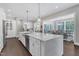 Beautiful kitchen with a large island, stainless steel appliances, and open layout at 7304 Hasentree Club Dr, Wake Forest, NC 27587