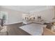 Relaxing living room with view to outdoor patio and backyard at 7304 Hasentree Club Dr, Wake Forest, NC 27587