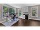 Bright office space with large windows, a functional desk, and custom cabinetry, perfect for productivity at 7304 Hasentree Club Dr, Wake Forest, NC 27587