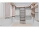 The walk-in closet has custom shelving and ample storage at 7304 Hasentree Club Dr, Wake Forest, NC 27587