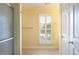 Bathroom featuring shuttered window and tile floors at 7405 Chickadee Ct, Sanford, NC 27332
