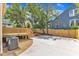 Spacious backyard with a new wooden deck, concrete patio and gravel area at 801 N Elm St, Durham, NC 27701