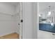 Bathroom featuring blue cabinets, black and white tiled walls, and black fixtures at 801 N Elm St, Durham, NC 27701