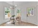 Charming breakfast nook features natural light, neutral color scheme, an exterior view, and stylish lighting at 801 N Elm St, Durham, NC 27701