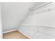 Walk-in closet with wood floors and wire shelving at 801 N Elm St, Durham, NC 27701