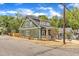 Charming curb appeal showcasing a manicured lawn, inviting front porch, and craftsman style at 801 N Elm St, Durham, NC 27701