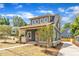 Charming craftsman style home with a welcoming front porch and beautifully landscaped front yard at 801 N Elm St, Durham, NC 27701