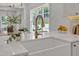 Kitchen with a large sink, quartz countertop, and new faucet fixtures at 801 N Elm St, Durham, NC 27701