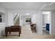 Spacious basement with light floors, and sliding doors to the back yard, perfect for entertaining at 805 Camden Ave, Durham, NC 27701