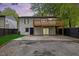 Charming two-story home features a deck, patio, and fenced yard for outdoor living at 805 Camden Ave, Durham, NC 27701