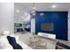Bright open-plan living room featuring hardwood floors and recessed lighting at 805 Camden Ave, Durham, NC 27701