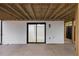 Covered patio has sleek black sliding glass door; perfect for enjoying the outdoors at 805 Camden Ave, Durham, NC 27701