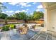 Spacious backyard patio with outdoor seating, lush lawn, and privacy fence, creating a tranquil retreat at 909 N Gregson St, Durham, NC 27701