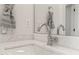 Close up of white countertop and chrome faucet in bathroom at 909 N Gregson St, Durham, NC 27701