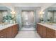 Spacious bathroom with double vanities, a walk-in shower, and stylish decor at 909 N Gregson St, Durham, NC 27701