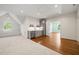 Bonus room with bar area, built-in bench seating and large window at 909 N Gregson St, Durham, NC 27701
