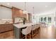 Bright, airy kitchen with a large island and modern pendant lighting at 909 N Gregson St, Durham, NC 27701