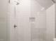Close up of glass enclosed shower with white subway tile at 909 N Gregson St, Durham, NC 27701