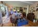 Charming bedroom with hardwood floors, cozy sitting area, and tranquil decor at 915 Phils Creek Rd, Chapel Hill, NC 27516