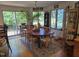 Dining area features a round table with seating and large windows offering beautiful outdoor views at 915 Phils Creek Rd, Chapel Hill, NC 27516