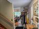 Entryway leading into the living room with a hat rack and artwork at 915 Phils Creek Rd, Chapel Hill, NC 27516