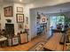Stylish living room with hardwood floors flowing into the adjacent kitchen at 915 Phils Creek Rd, Chapel Hill, NC 27516